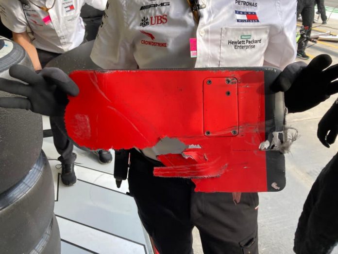 Ferrari formulas grīdas gabals Botasa mašīnā